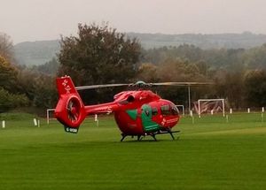 An air ambulance lands at the Chirk AAA ground