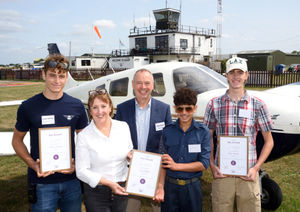Linda Grocott and Paul Latham pictured with recipients Archie Holland, Ryan Chahal and James Hebson