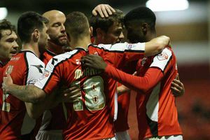 Jordy Hiwula of Walsall celebrates his second goal.