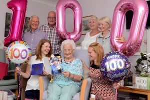 Olive McGarry celebrating her 100th birthday with her family