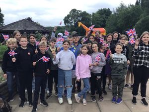 Supporting image for story: European visitors join in with flag waving at jubilee jamboree 