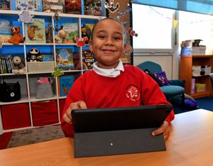 Pics at Thorns Primary School, Brierley Hill, for School Focus feature.Azari on the tablet.