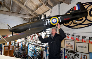 Alec Brew, curator at Tettenhall Transport Heritage Centre, with a 1/4 scale model of a Wolverhampton built Boulton Paul Defiant night fighter