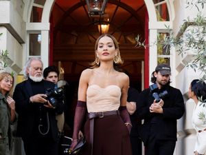 Supporting image for story: Rita Ora leans into opera glove trend at London launch for new haircare brand