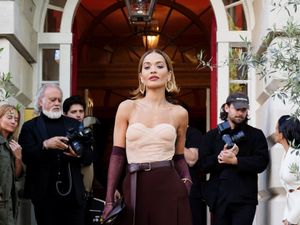 Supporting image for story: Rita Ora leans into opera glove trend at London launch for new haircare brand