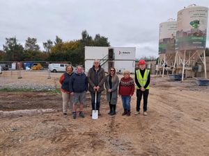 Louis Brookes, apprentice site manager for SJ Roberts Construction (right), with representatives of Marden Parish Council