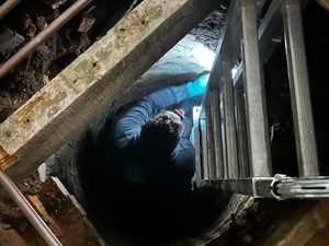 Supporting image for story: Couple find secret hidden 10ft deep well in middle of living room