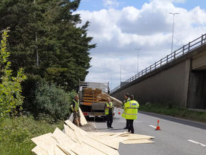 Supporting image for story: WATCH: Warning after roadworker struck by metal from lorry