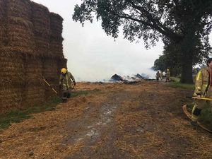 Crews remained at the scene throughout Saturday damping down