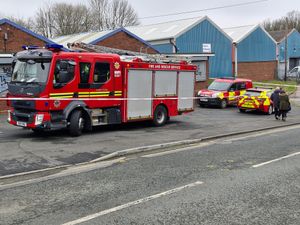 A fire crew could be seen working at the scene the morning after the fire