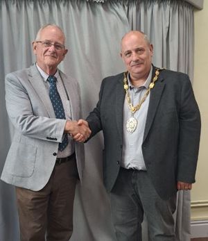 New Market Drayton mayor Tim Manton (right) with outgoing mayor Roy Aldcroft (left). Picture: Market Drayton Town Council.