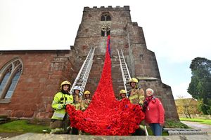 All Saints Church, in Baschurch, Shrewsbury, where Baschurch firefighters helped install a poppy display. The community came out to watch. Fire crew: Chloe Upton, Connor Willis, Simon Morris, Josh Dorner, Laurie Bridle and in red, organiser: Pauline McKie.