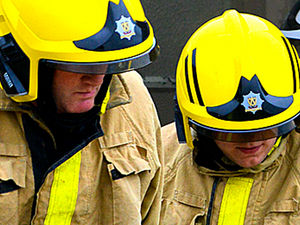 Supporting image for story: Fire crews rescue man stuck 40ft up in cherry picker at Shrewsbury Town football ground 