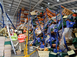 Supporting image for story: 'Challenging': Shropshire fire chief describes rescue of warehouse worker trapped under tonnes of cheese