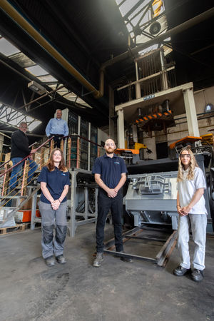 (l-r) Andy Callaghan (Foundry
Manager), Jessica Stone (Apprentice Engineer), Martin Haynes (MD), Liam Greaves
(Foundry Engineer) and Charlie Thomas (Apprentice Engineer) in front of the low
pressure furnace.
