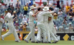Australia's Nathan Lyon (centre) celebrates after England's Ben Stokes (not pictured) was caught behind by Australia's Brad Haddin on 120 runs