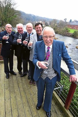 Raising a glass to Arthur Dyball (right) are former pupils Peter Brough, Chris Wright, Maurice Armand, and Nick Llewellyn.