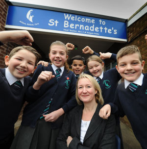 Headteacher Jayne Keegan-Hobbs is joined by pupils, left to right, Bobby Wright, 10, Georgia Blunt, 11, Jay Lammas, 11, Ellie Clews, 9, and Jesse Painter, 9, at St Bernadettes's Primary School
