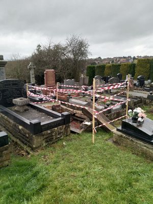 The area around the grave has been taped off for safety