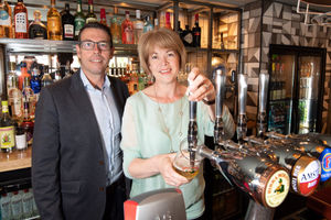 MP Wendy Morton pulls a pint