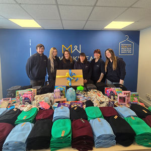 Members of the MyWorkwear team pictured with their Christmas Smile Project donations.