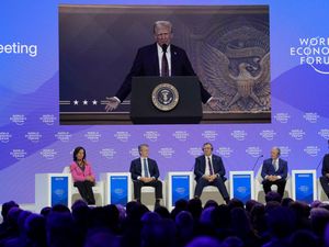 Supporting image for story: Trump tells Davos elite to invest in US or face tariffs