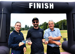 Winner in the 400m swim and 5k run Open 19-39 category - Francis Marsh with Ellie Shufflebotham of Freedom Leisure, Builth Wells and Builth Wells Deputy Mayor Councillor Alan Waller. Image by Ted Edwards Photography