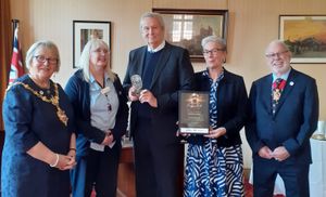 Martin Jones (centre) receiving his award in the Mayor's