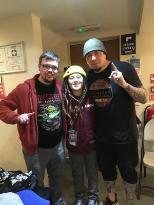 P.O.D. fan Joe Hayes, left, met frontman Sonny Sandoval, right, and Sonny's 11-year-old son Justice before the gig. Justice joined P.O.D. on stage during the gig     photo: Joe Hayes