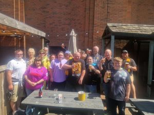 Supporting image for story: Sun shines on last away day coach trip of 'a great season' for Wolves fans ahead of final day party at The Wheatsheaf
