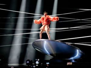Supporting image for story: Switzerland’s Nemo balances on metal disc during Eurovision performance