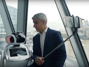 Supporting image for story: Mayor of London Sadiq Khan takes selfie with a robot to promote London Tech Week