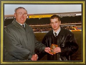 Eric Moore, left, hands out at award. Moore was director and then chairman of Metalrax, who sponsored Albion ballboys in the 1970s and was also the sponsor of the iconic scoreboard in the Woodman Corner. 