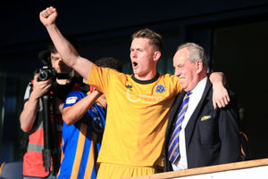 Shrewsbury Town goalkeeper Dean Henderson celebrates with Shrewsbury Town Chairman Roland Wycherley
