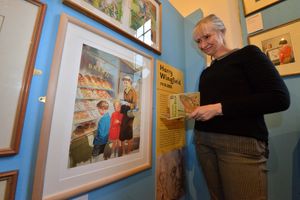 Helen Day at an exhibition she put together to celebrate the Ladybird book series