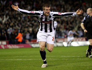 Chris Brunt celebrates his winner. He took interim charge of Albion before Mowbray's appointment.