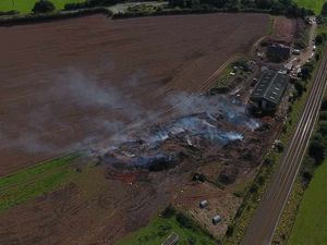 Supporting image for story: Rugeley farm fire: See how the blaze that's burned for WEEKS looks from above