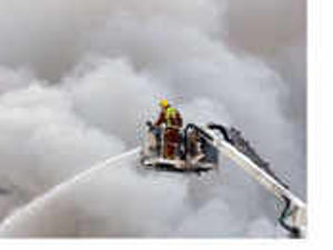 Supporting image for story: Smoke billows in scrapyard fire