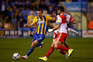 Shaun Whalley of Shrewsbury Town and Joe Jacobson of Wycombe Wanderers (AMA)