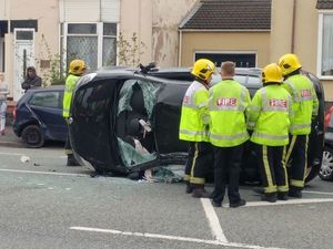 Supporting image for story: Car flips onto side in Bilston crash