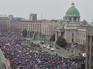 Tens of thousands gather in front of the Serbian parliament