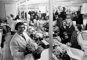 Stallholder Paul Marsh ready for business at West Bromwich's new indoor market, which opened in  October 1973