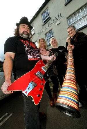 Manager Emily Hardman, Chris Perry on guitar, compare Luci Ross and digeridoo performer Sophie Harrison