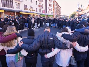 Supporting image for story: Hundreds march in silence to honour victims of Swiss bar fire