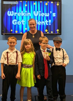 Deputy headteacher (and MC for the evening) Lesley Stephenson, with pupils Kyle Brittain, Kyla Shelley, Nikodem Kamusella, Rio Richards.