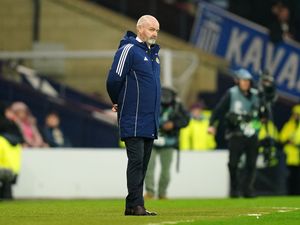 Steve Clarke watches from the touchline at Hampden