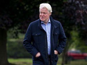 Earl Spencer walking outside