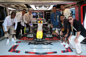 Morgan Rogers and Morgan Gibbs-White among the England stars enjoying a look around the Red Bull garage in Barcelona (PA)