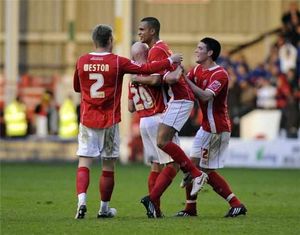 Matt Richards and Darren Byfield struck either side of half-time to give Walsall a third straight home win.