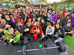 Supporting image for story: Fitness fanatics join in a festive session of Crossfit craze